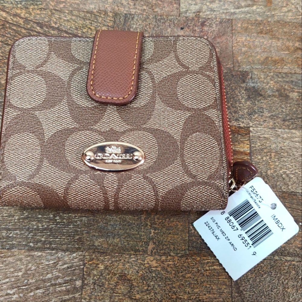 Coach medium tan khaki wallet with Logo print and rare gold plate